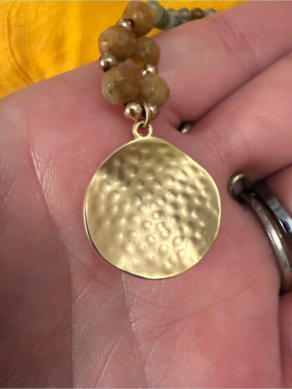 BoHo beaded statement necklace with hammered gold pendant
